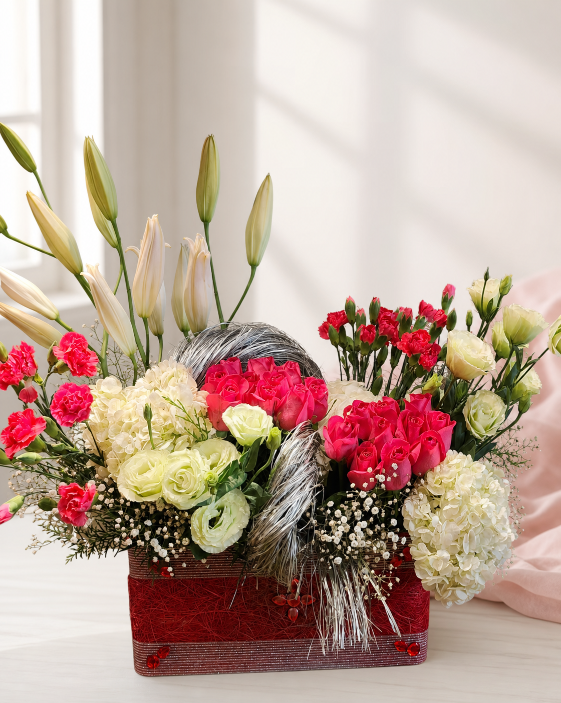 Red rose, white lily and hydrangea luxury flower basket by James Flowers Mumbai