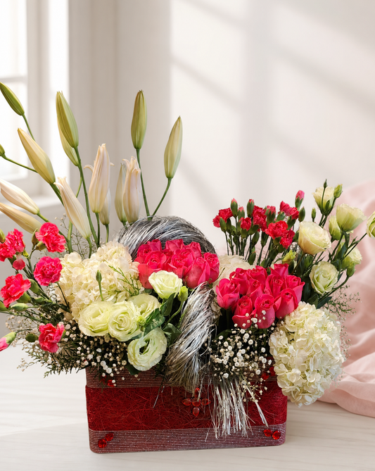 Red rose, white lily and hydrangea luxury flower basket by James Flowers Mumbai