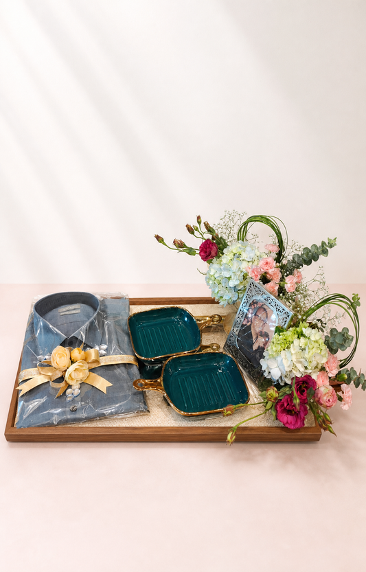 Personalised gift hamper with shirt, serving dishes, photo frame and fresh flowers by James Flowers Mumbai