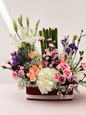 Pink lily, peach rose and hydrangea luxury flower basket by James Flowers Mumbai