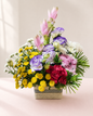 Pink lily, red rose and purple lisianthus mixed flower basket by James Flowers Mumbai